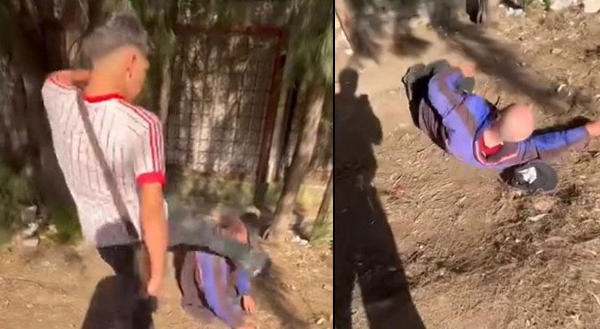 İzmir'de skandal! Sokakta uyuyan yaşlı adamın yüzüne tekme attı